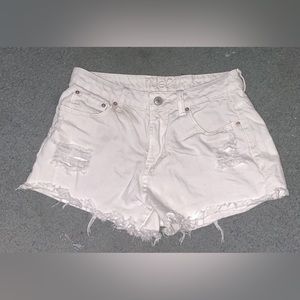 Slightly worn white jean shorts